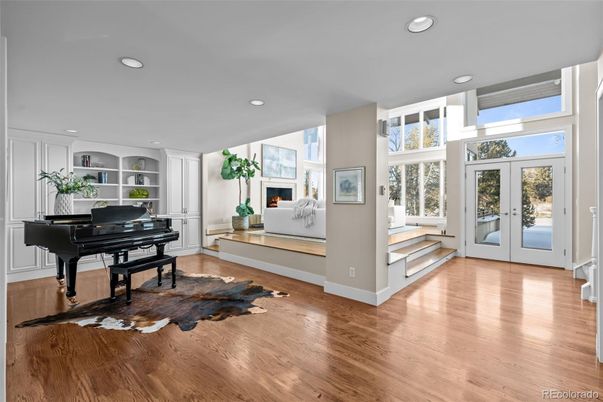 Fireplace, Interior, Piano, Recessed Lighting, Wood Texture Flooring