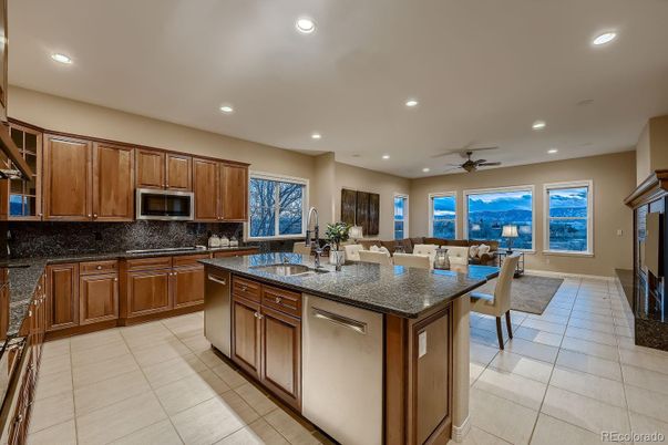 Dining room, Fireplace, Interior, Kitchen, Living room, Recessed Lighting, Stainless Steel Appliances