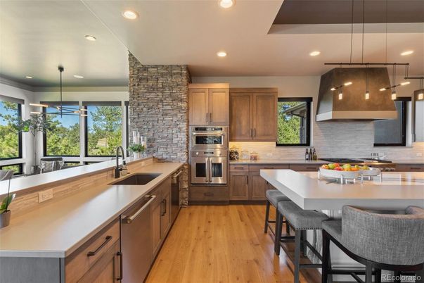 Interior, Kitchen, Pendant Lights, Recessed Lighting, Stainless Steel Appliances, Stone Walls, Wood Texture Flooring