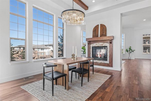 Chandelier, Dining room, Fireplace, Interior, Recessed Lighting, Wooden Beams, Wood Texture Flooring