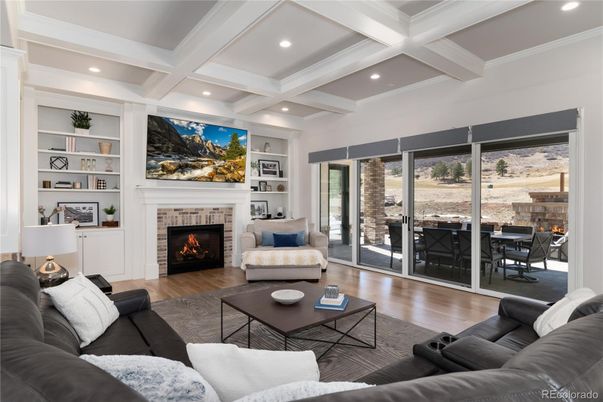 Dining room, Fireplace, Interior, Living room, Recessed Lighting, Wood Texture Flooring
