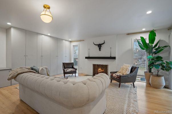 Fireplace, Interior, Living room, Recessed Lighting, Wood Texture Flooring