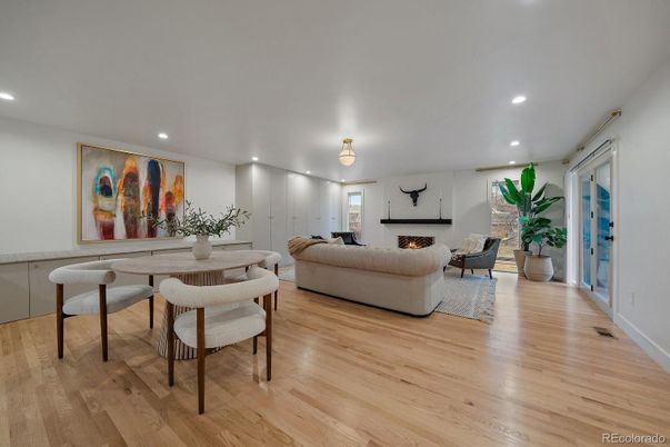 Dining room, Fireplace, Interior, Living room, Recessed Lighting, Wood Texture Flooring