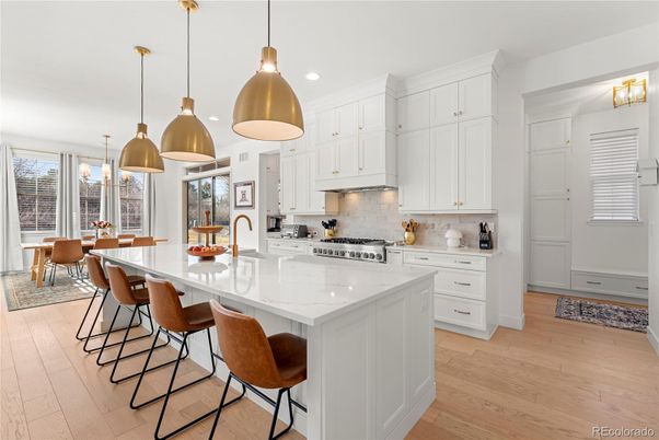 Dining room, Interior, Kitchen, Pendant Lights, Recessed Lighting, Stainless Steel Appliances, Wood Texture Flooring