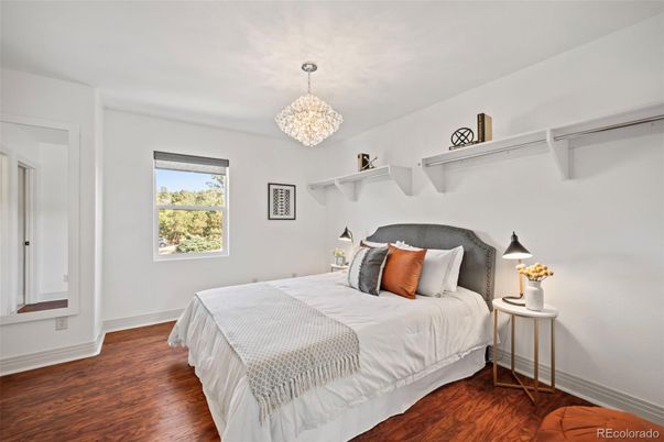 Bedroom, Chandelier, Fireplace, Interior, Wood Texture Flooring