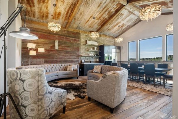 Chandelier, Dining room, Interior, Kitchen, Living room, Pendant Lights, Stainless Steel Appliances, Stone Walls, Wooden Beams, Wooden Ceilings, Wood Texture Flooring
