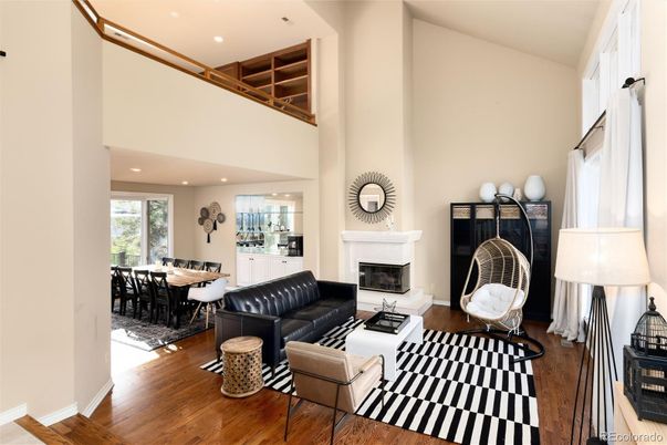 Dining room, Fireplace, Interior, Living room, Recessed Lighting, Wood Texture Flooring