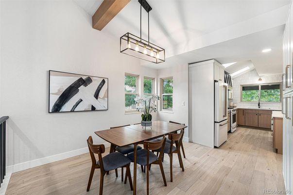 Dining room, Interior, Kitchen, Pendant Lights, Recessed Lighting, Stainless Steel Appliances, Wooden Beams, Wood Texture Flooring