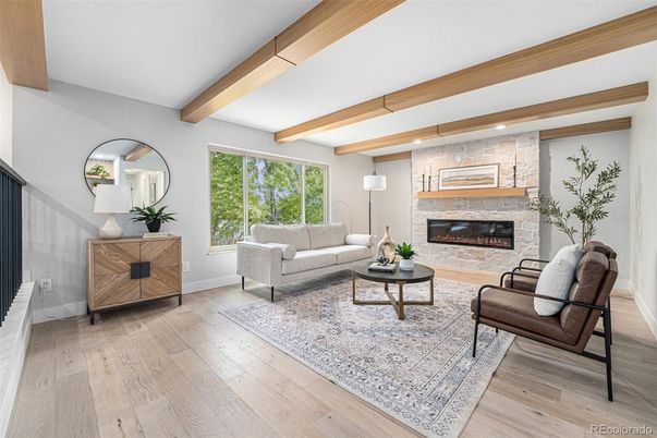 Fireplace, Interior, Living room, Pendant Lights, Recessed Lighting, Stone Walls, Wooden Beams, Wood Texture Flooring