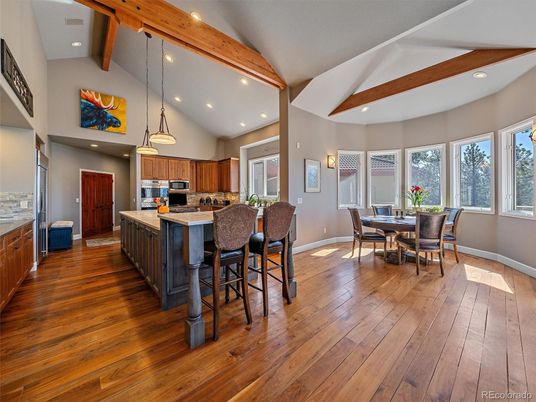 Dining room, Interior, Kitchen, Pendant Lights, Recessed Lighting, Stainless Steel Appliances, Wooden Beams, Wood Texture Flooring