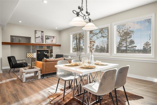 Dining room, Fireplace, Interior, Living room, Pendant Lights, Recessed Lighting, Wood Texture Flooring