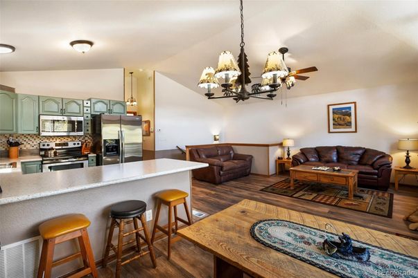 Chandelier, Interior, Kitchen, Living room, Pendant Lights, Stainless Steel Appliances, Wood Texture Flooring