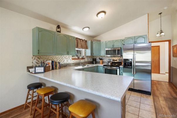 Interior, Kitchen, Pendant Lights, Stainless Steel Appliances, Wood Texture Flooring