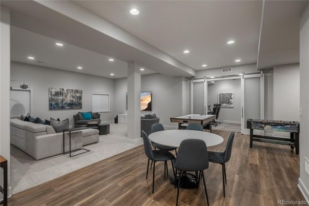 Dining room, Game Room, Interior, Living room, Recessed Lighting, Wood Texture Flooring