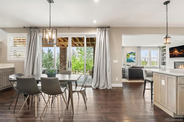 Dining room, Fireplace, Interior, Living room, Pendant Lights, Recessed Lighting, Wood Texture Flooring