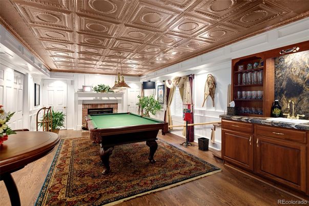 Billiard Table, Fireplace, Game Room, Interior, Recessed Lighting, Wood Texture Flooring