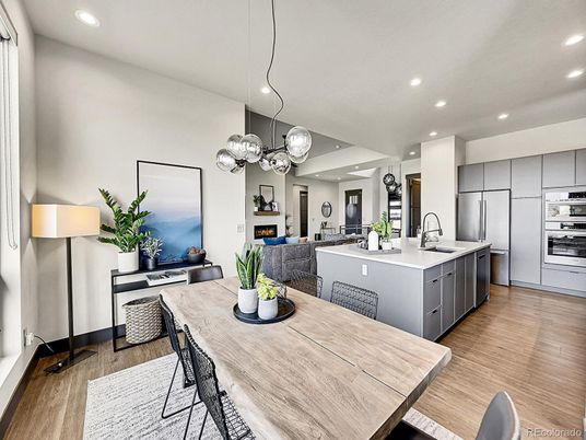 Dining room, Interior, Kitchen, Living room, Pendant Lights, Recessed Lighting, Stainless Steel Appliances, Wood Texture Flooring