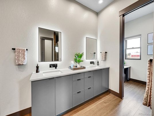 Bathroom, Dual Sink Vanities, Interior, Recessed Lighting, Wood Texture Flooring