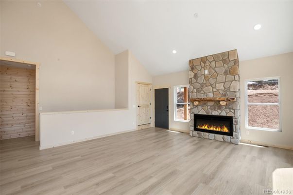 Empty room, Fireplace, Interior, Recessed Lighting, Wood Texture Flooring, Wooden Walls