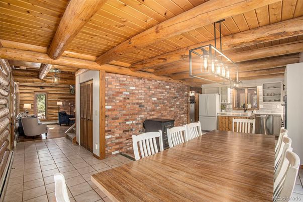 Dining room, Fireplace, Interior, Kitchen, Living room, Pendant Lights, Stone Walls, Wooden Beams, Wooden Ceilings