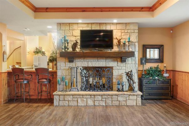 Fireplace, Interior, Recessed Lighting, Stone Walls, Wood Texture Flooring