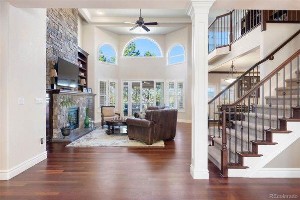 Fireplace, Interior, Living room, Recessed Lighting, Stone Walls, Wood Texture Flooring