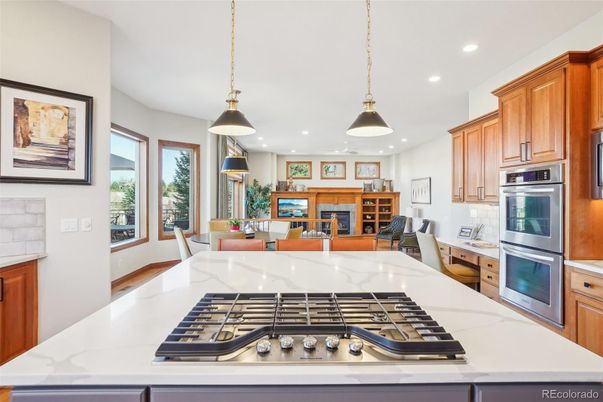 Dining room, Fireplace, Interior, Kitchen, Living room, Pendant Lights, Recessed Lighting, Stainless Steel Appliances
