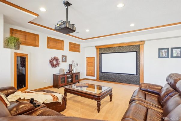 Interior, Living room, Projection Screen, Recessed Lighting, Theatre Room, Wood Texture Flooring