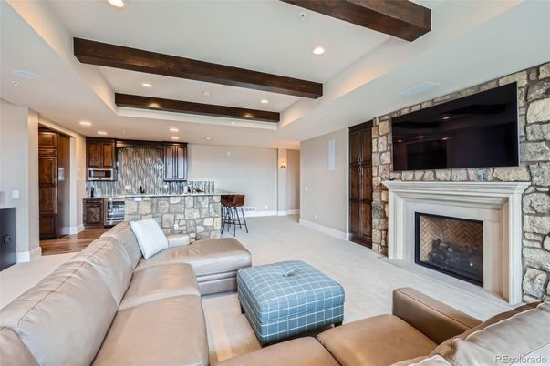 Fireplace, Interior, Kitchen, Living room, Recessed Lighting, Stainless Steel Appliances, Stone Walls, Wooden Beams, Wood Texture Flooring