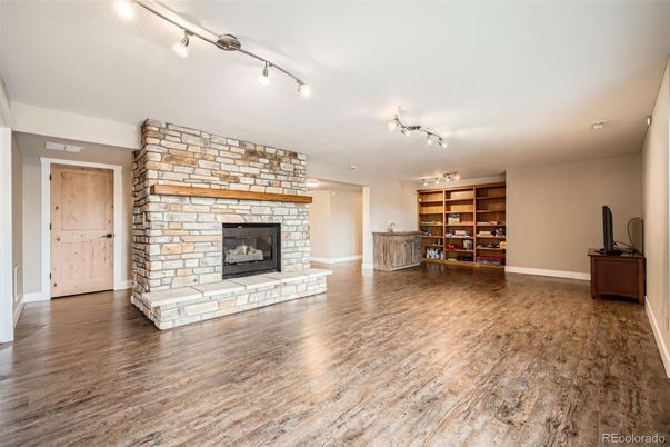 Empty room, Fireplace, Interior, Stone Walls, Wood Texture Flooring