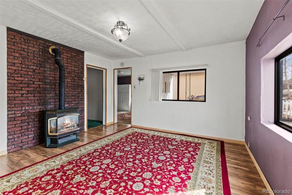 Empty room, Fireplace, Interior, Stone Walls, Wood Texture Flooring