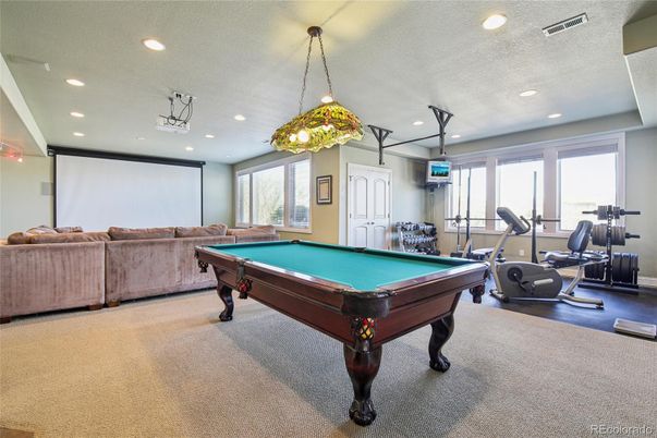 Billiard Table, Fitness Equipment, Game Room, Interior, Pendant Lights, Recessed Lighting, Wood Texture Flooring