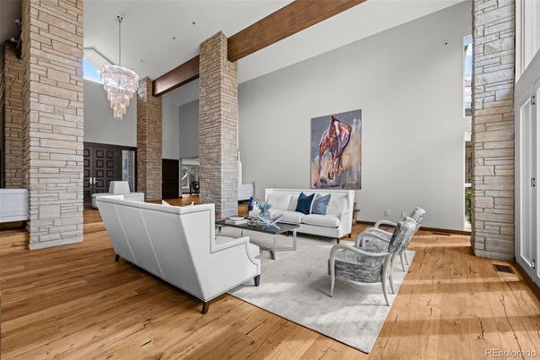 Chandelier, Fireplace, Interior, Living room, Stone Walls, Wooden Beams, Wood Texture Flooring