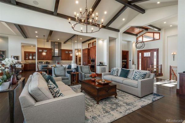Chandelier, Interior, Kitchen, Living room, Pendant Lights, Recessed Lighting, Stainless Steel Appliances, Wooden Beams, Wood Texture Flooring