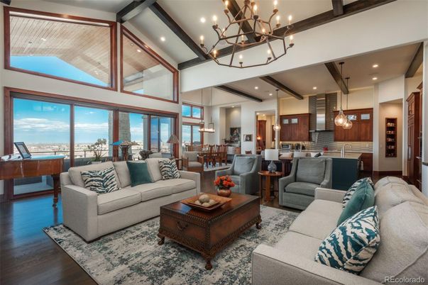 Chandelier, Dining room, Interior, Kitchen, Living room, Pendant Lights, Piano, Recessed Lighting, Stainless Steel Appliances, Wooden Beams, Wood Texture Flooring