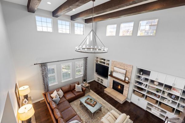 Chandelier, Fireplace, Interior, Living room, Pendant Lights, Recessed Lighting, Wooden Beams, Wood Texture Flooring