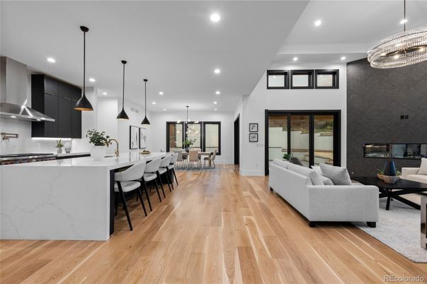 Dining room, Interior, Kitchen, Living room, Pendant Lights, Recessed Lighting, Stainless Steel Appliances, Wood Texture Flooring