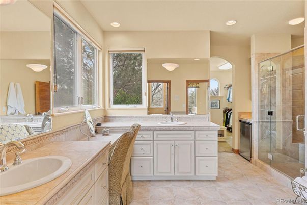 Bathroom, Dual Sink Vanities, Glass Shower, Interior, Recessed Lighting, Tile Countertops