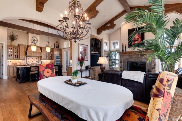 Chandelier, Dining room, Fireplace, Interior, Kitchen, Living room, Pendant Lights, Stainless Steel Appliances, Wooden Beams, Wood Texture Flooring