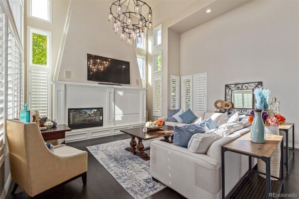 Chandelier, Fireplace, Interior, Living room, Recessed Lighting, Wood Texture Flooring