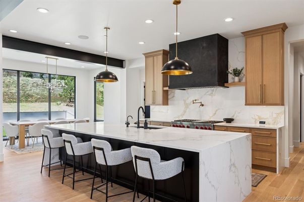 Interior, Kitchen, Marble Walls, Pendant Lights, Recessed Lighting, Wood Texture Flooring
