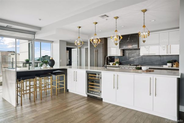 Interior, Kitchen, Marble Walls, Pendant Lights, Recessed Lighting, Wood Texture Flooring
