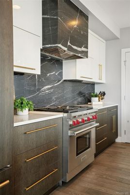 Interior, Kitchen, Marble Walls, Stainless Steel Appliances, Wood Texture Flooring