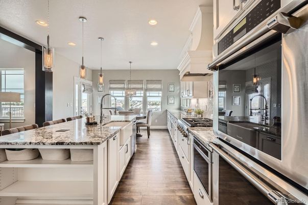 Chandelier, Dining room, Interior, Kitchen, Pendant Lights, Recessed Lighting, Stainless Steel Appliances, Wood Texture Flooring