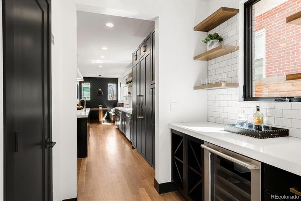 Interior, Kitchen, Pendant Lights, Recessed Lighting, Stainless Steel Appliances, Stone Walls, Wood Texture Flooring
