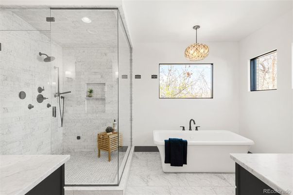 Bathroom, Free Standing Baths, Glass Shower, Interior, Marble, Marble Walls, Pendant Lights, Recessed Lighting