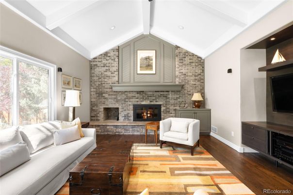 Fireplace, Interior, Living room, Recessed Lighting, Stone Walls, Wood Texture Flooring