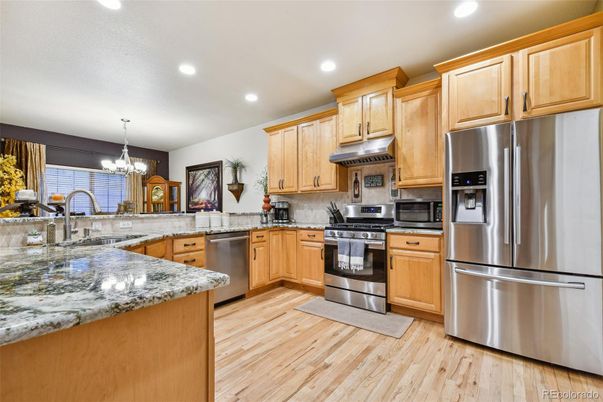 Chandelier, Interior, Kitchen, Recessed Lighting, Stainless Steel Appliances, Wood Texture Flooring