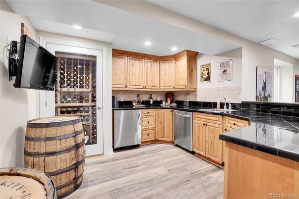 Interior, Kitchen, Recessed Lighting, Stainless Steel Appliances, Tile Countertops, Wood Texture Flooring