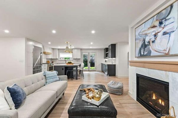 Dining room, Fireplace, Interior, Kitchen, Living room, Pendant Lights, Recessed Lighting, Stainless Steel Appliances, Wood Texture Flooring